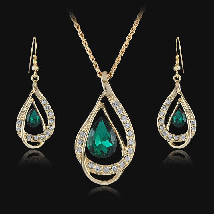 Collier et boucles d'oreilles sertis de cristaux à double goutte