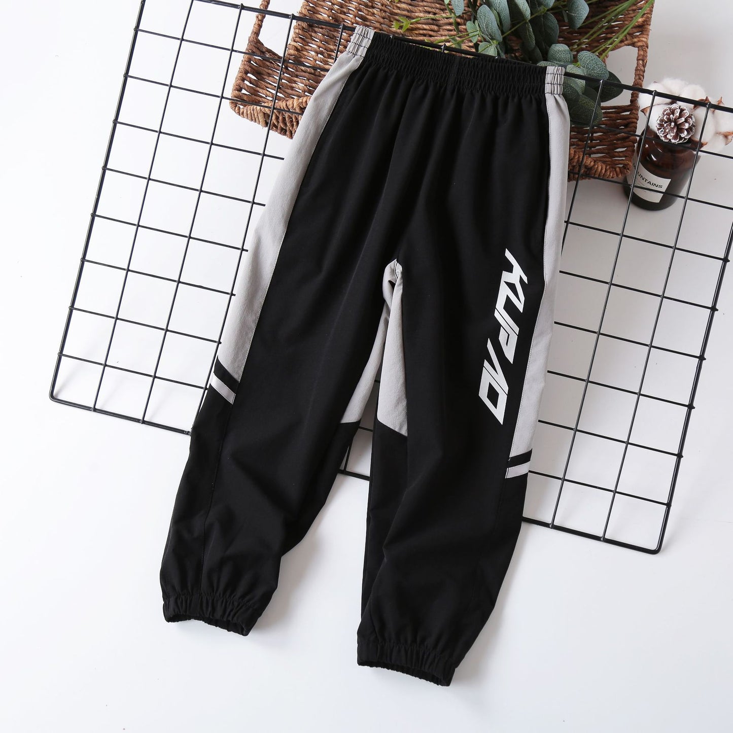 Pantalons pour garçons printemps et été minces Leggings d'épissage coréens pour enfants Zhongda Pantalons anti-moustiques pour enfants à séchage rapide