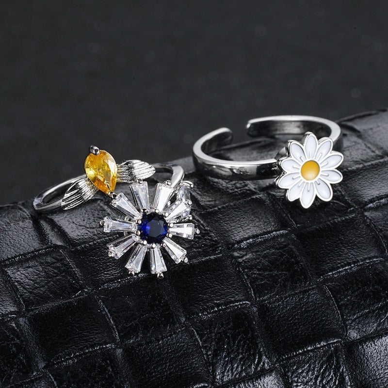 Vridbara ringar Ögonblommor Ångestringar för kvinnor Fidget Spinner Ringsmycken