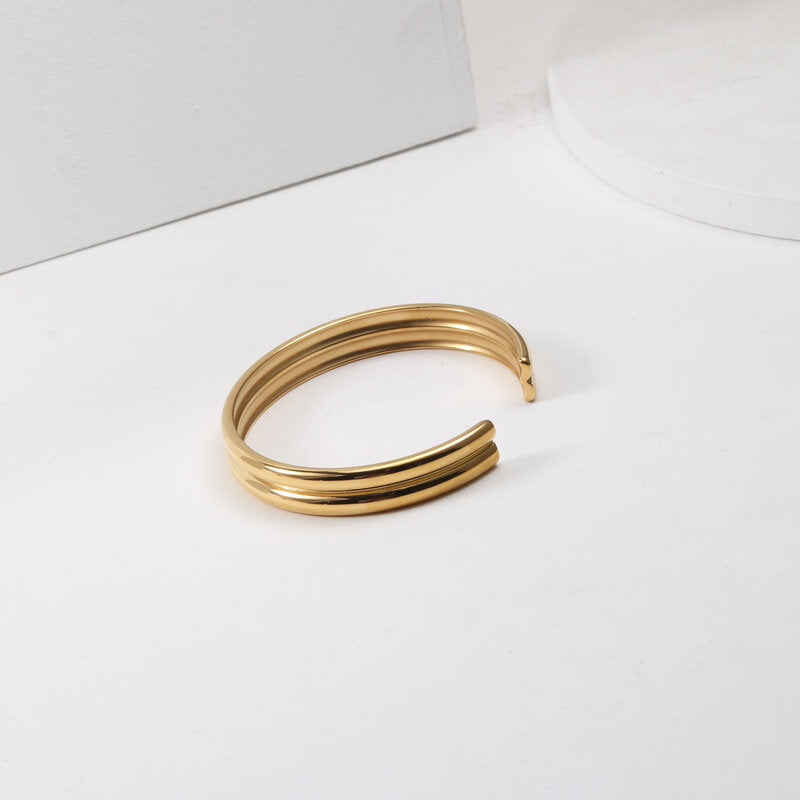 Bracelet en acier titane double courbé