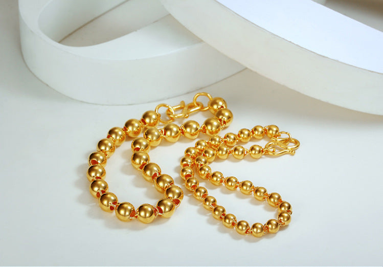 Bracelet pour hommes en perles rondes avec imitation d'or 24 carats