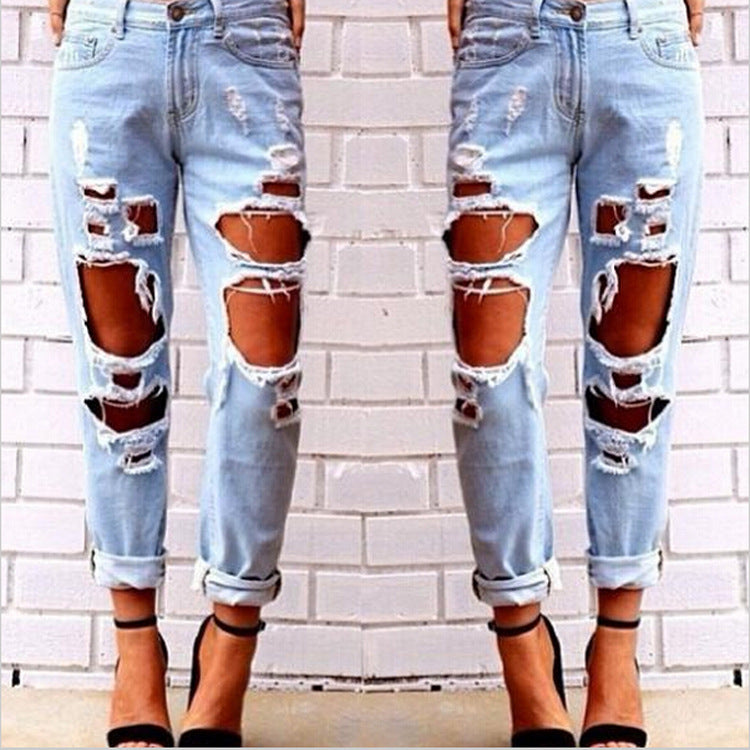 Aliexpress explosion Europe Code lâche sauvage sexy grand trou mendiant exagéré petit ami jeans