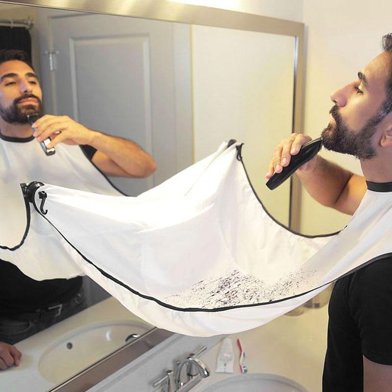 Tablier de capture de rasage de barbe de cheveux d'homme créatif