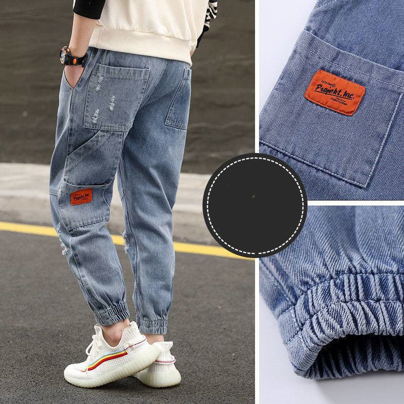 Pojkjeans och byxor Grundskoleelever Löst västerländskt modell