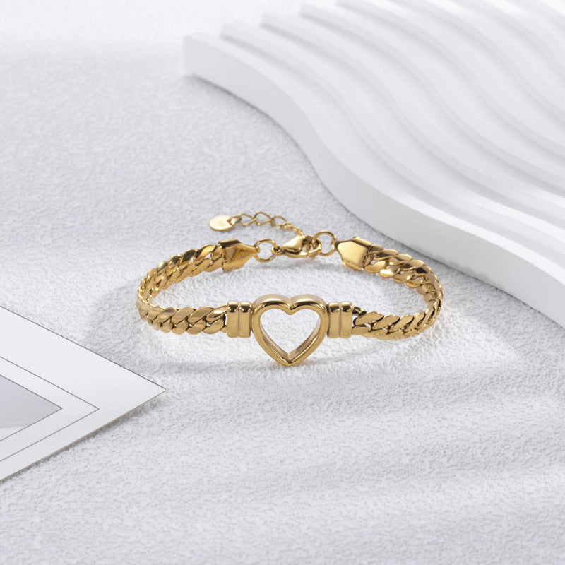 Fashion Simple Hollow Heart Titanium stålarmband