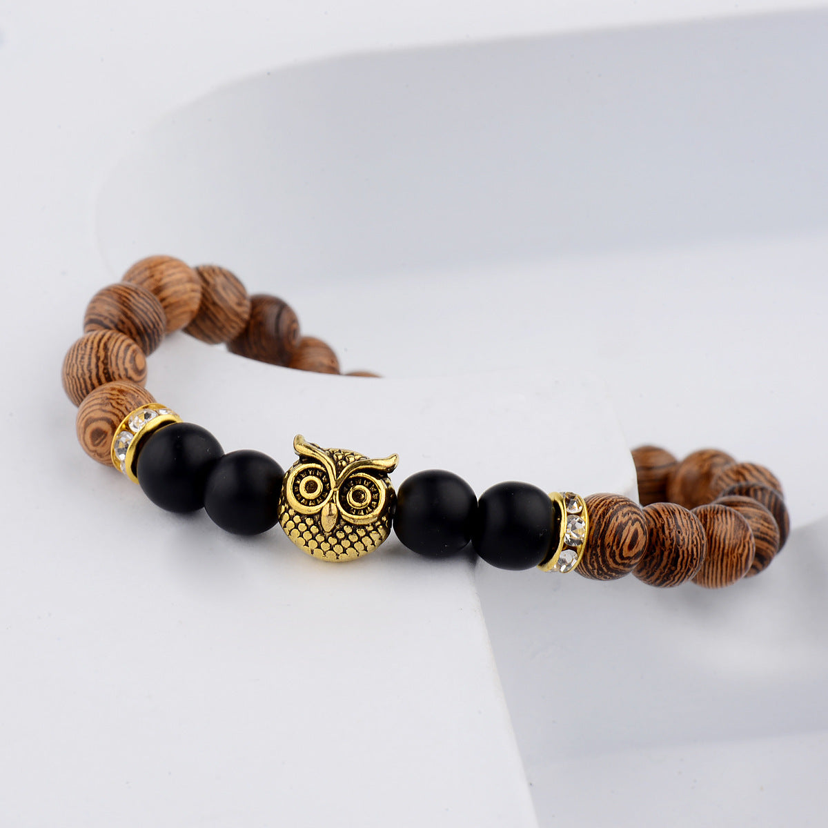 Armband med livlina i träfiber med frostad sten och uggla