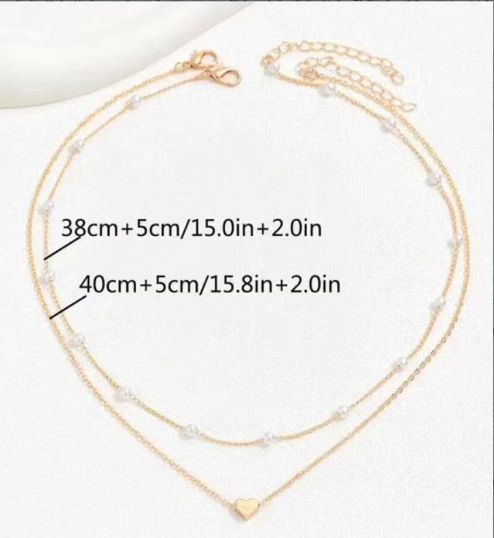 Specialintresserade design dubbellager Twin Pearl Heart halsband