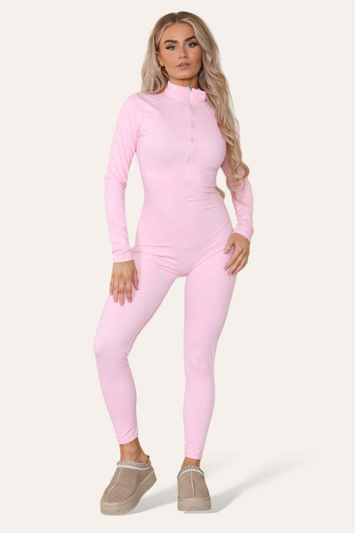Ribbad jumpsuit med hög halsringning och dragkedja och krage framtill