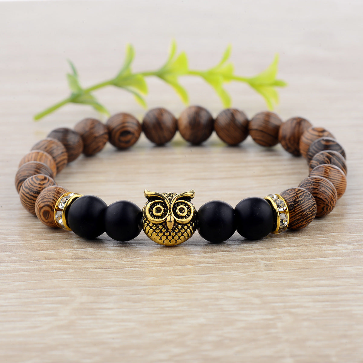 Armband med livlina i träfiber med frostad sten och uggla