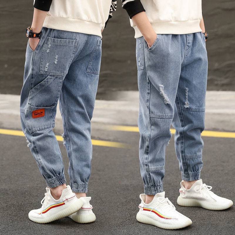 Pojkjeans och byxor Grundskoleelever Löst västerländskt modell