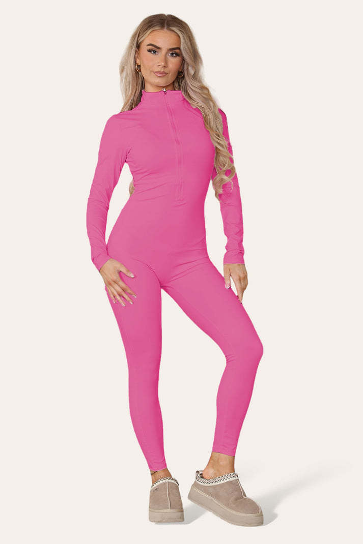 Ribbad jumpsuit med hög halsringning och dragkedja och krage framtill