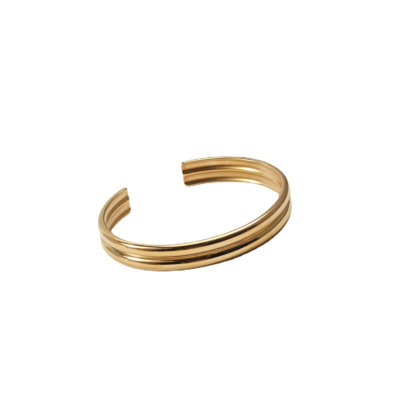 Bracelet en acier titane double courbé