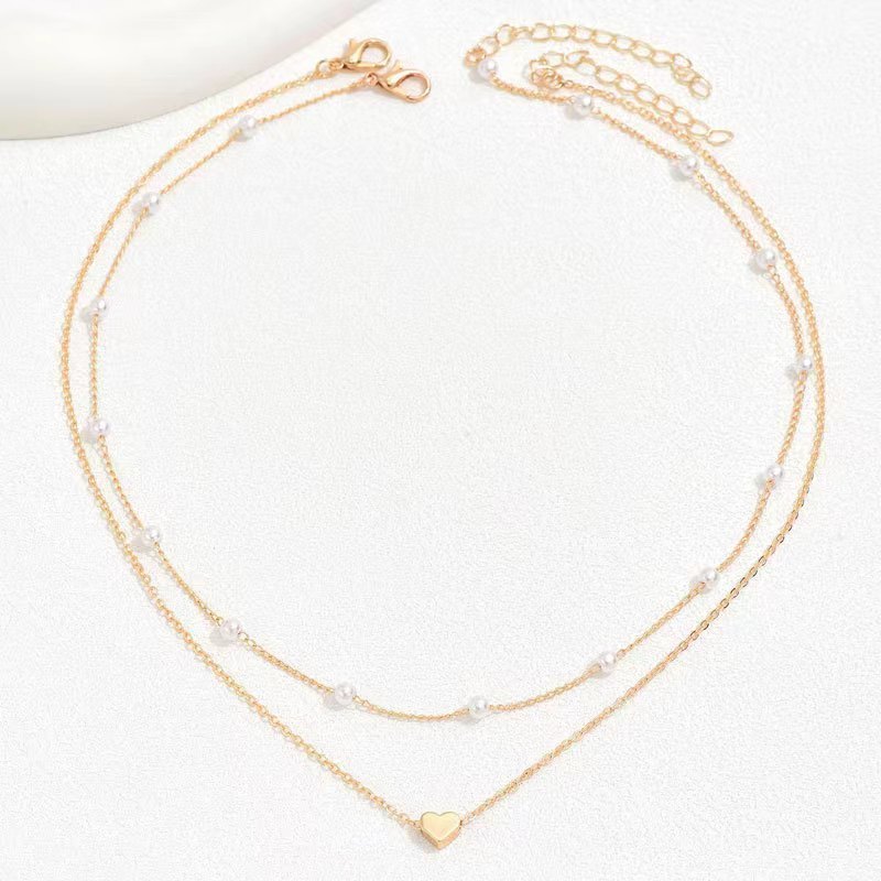 Specialintresserade design dubbellager Twin Pearl Heart halsband