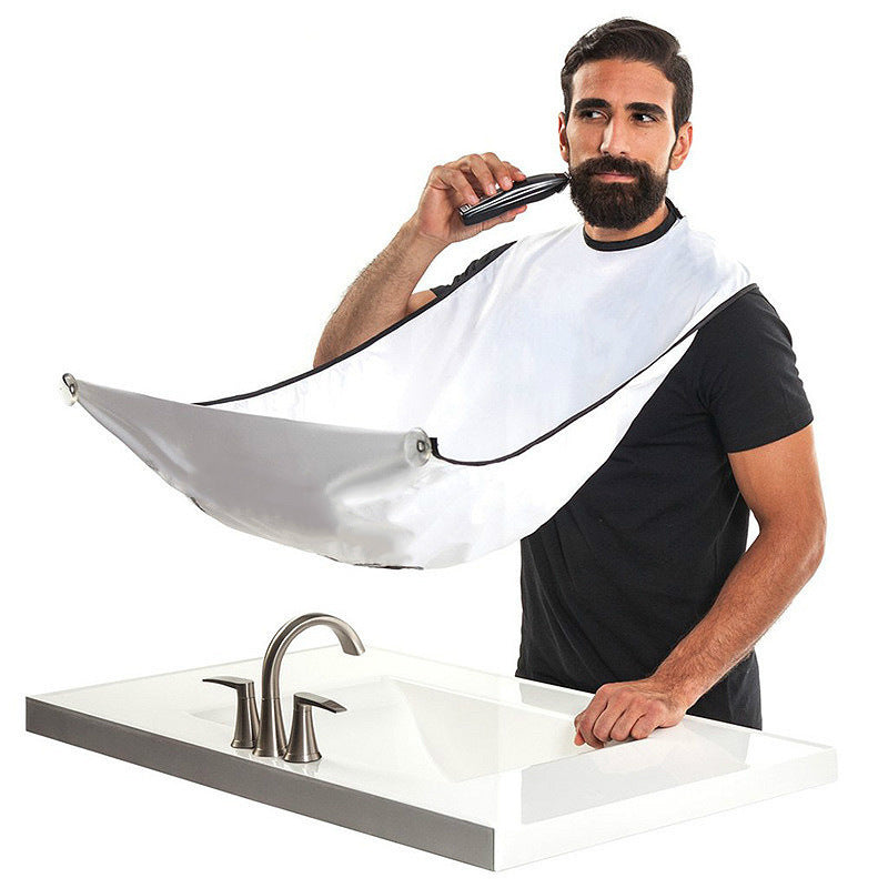 Tablier de capture de rasage de barbe de cheveux d'homme créatif