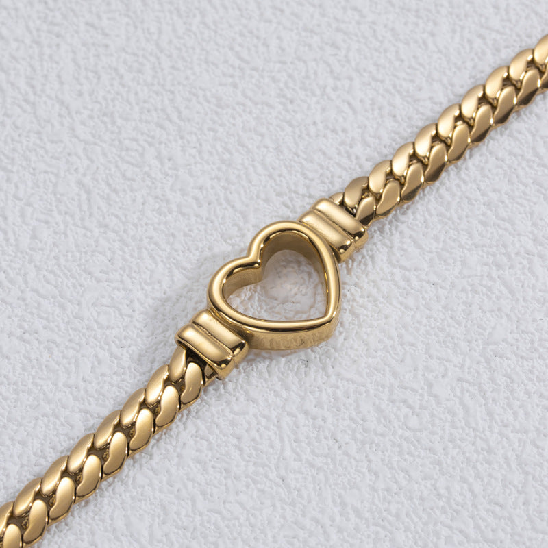 Fashion Simple Hollow Heart Titanium stålarmband