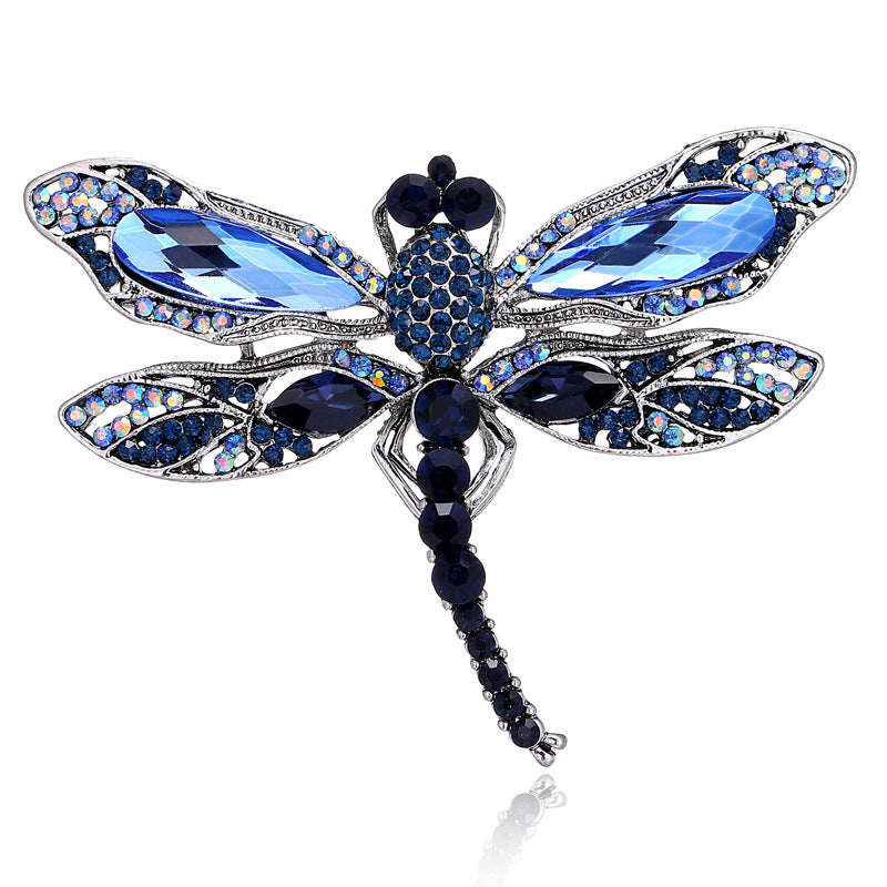 Broche libellule en strass