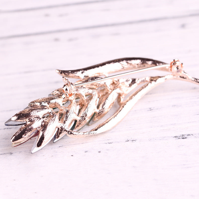 Crystal leaf brooch