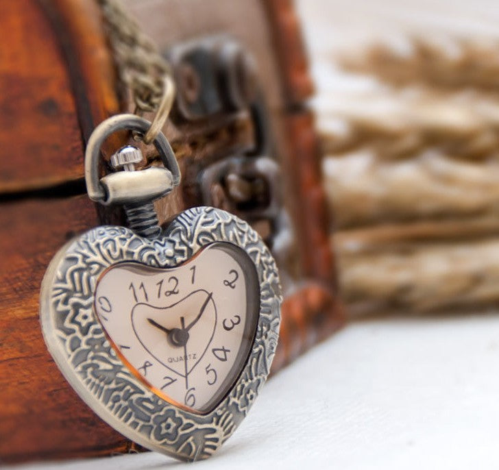 Brown cut peach heart pocket watch