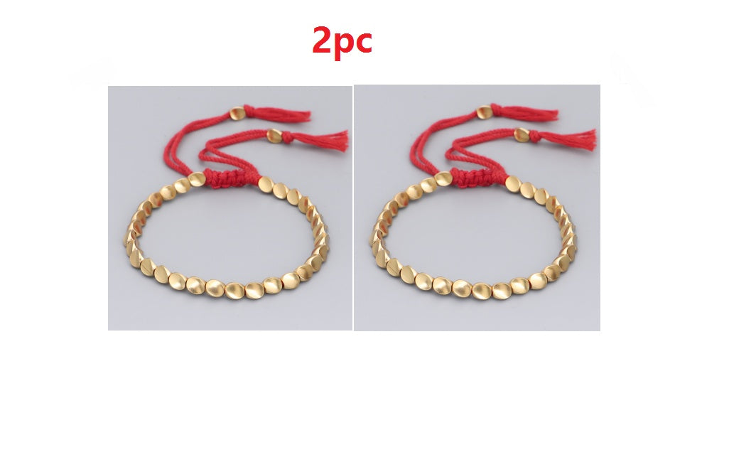 Handgjorda tibetanska buddhistiska armband på handen flätade kopparpärlor lyckorep armband och armband för kvinnor och män
