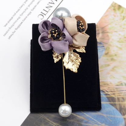 Broche fleur de perles