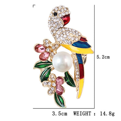 Broche perle oiseau