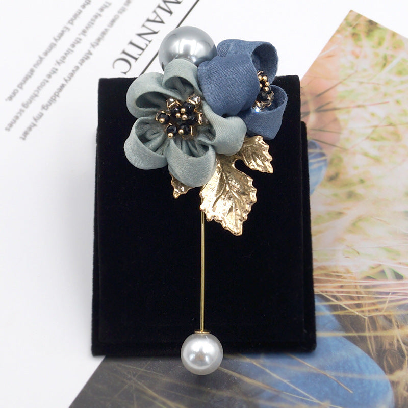 Broche fleur de perles