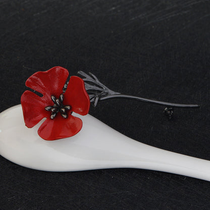 Broche fleur rouge