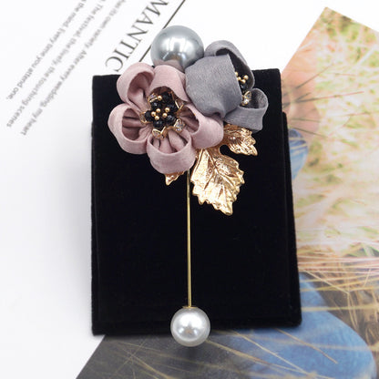 Broche fleur de perles