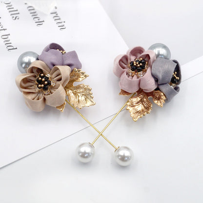 Broche fleur de perles