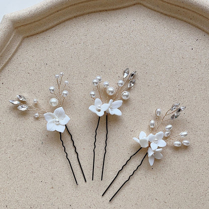 Three Sets Of White Flower U Shaped Hairpins