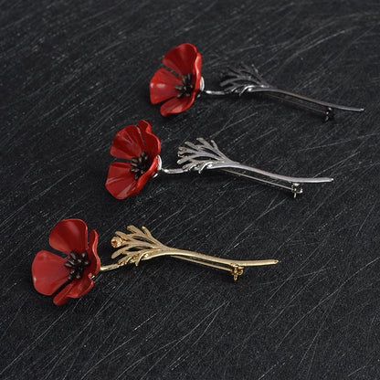 Broche fleur rouge