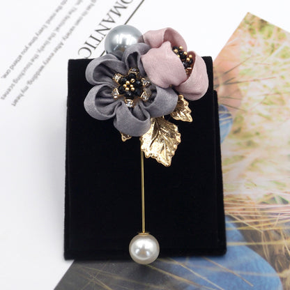 Broche fleur de perles