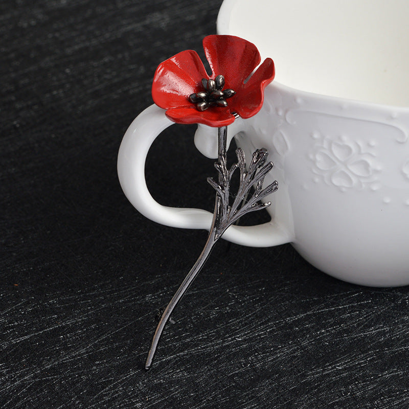 Broche fleur rouge