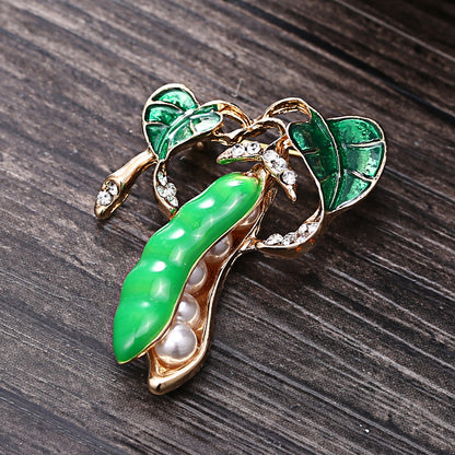 Pea diamond brooch