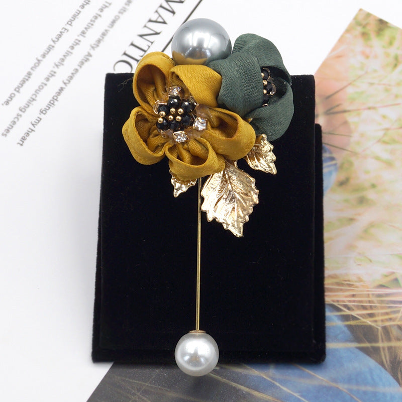 Broche fleur de perles