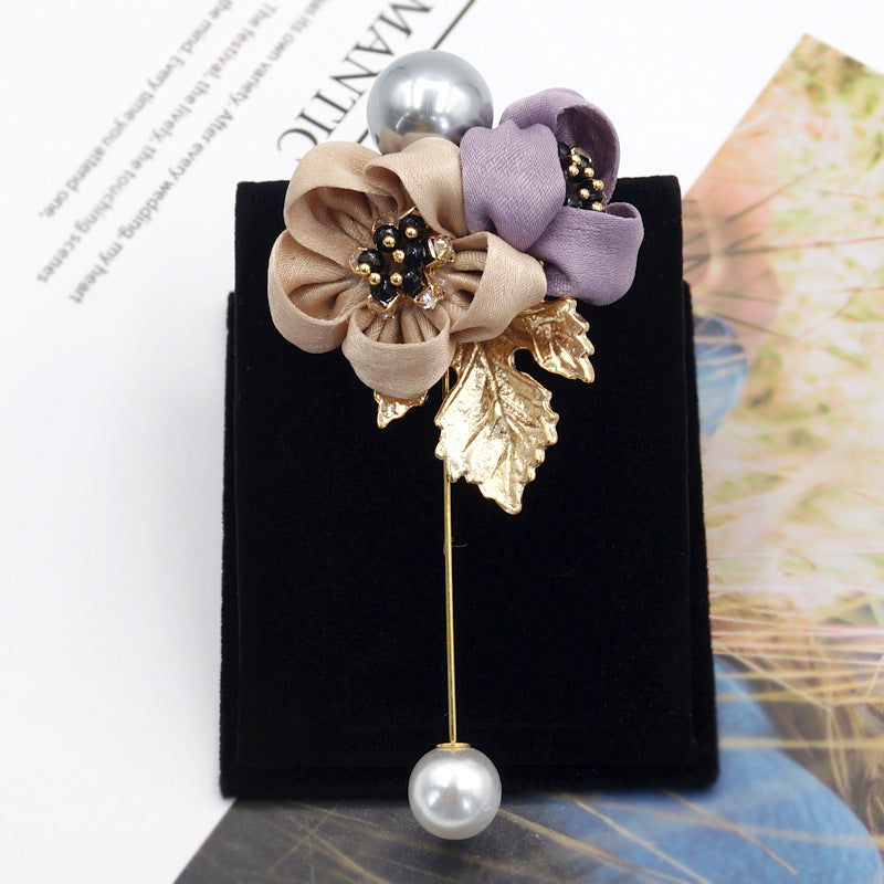 Broche fleur de perles