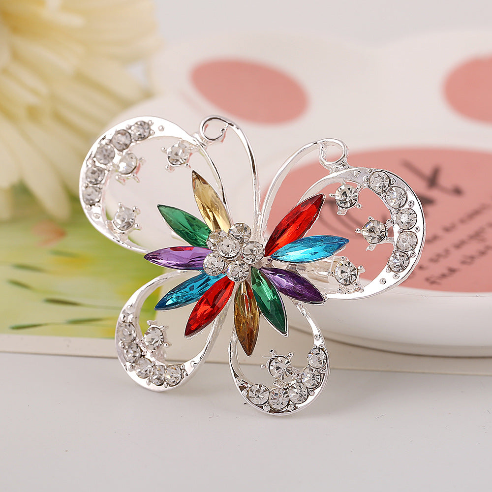 Broche de personnalité exagérée en forme de papillon, sertie de diamants