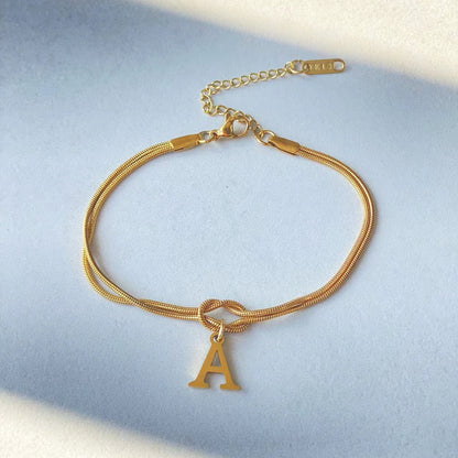 Nya bokstaven AZ kärleksknut armband för kvinnor par guldfärg läcker ormkedja berlockarmband rostfritt stål smycken present alla hjärtans dag presenter
