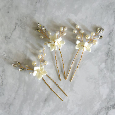 Three Sets Of White Flower U Shaped Hairpins