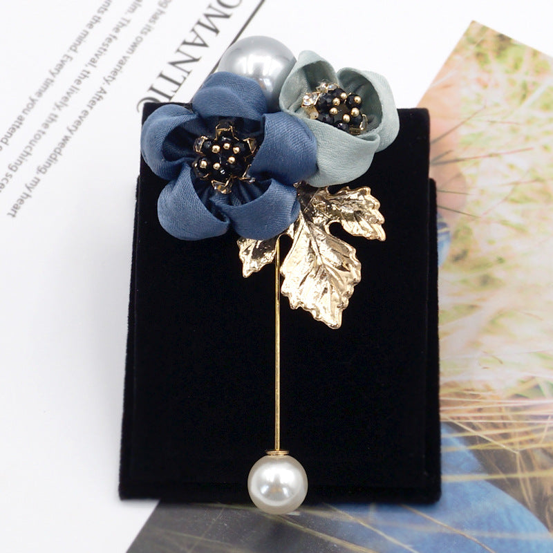 Broche fleur de perles