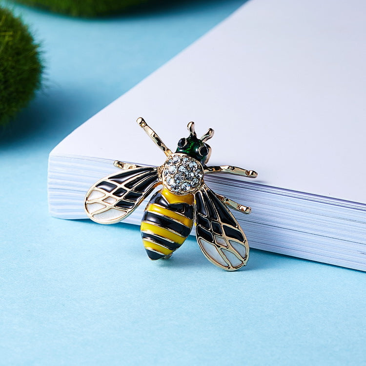 Dripping insect brooch