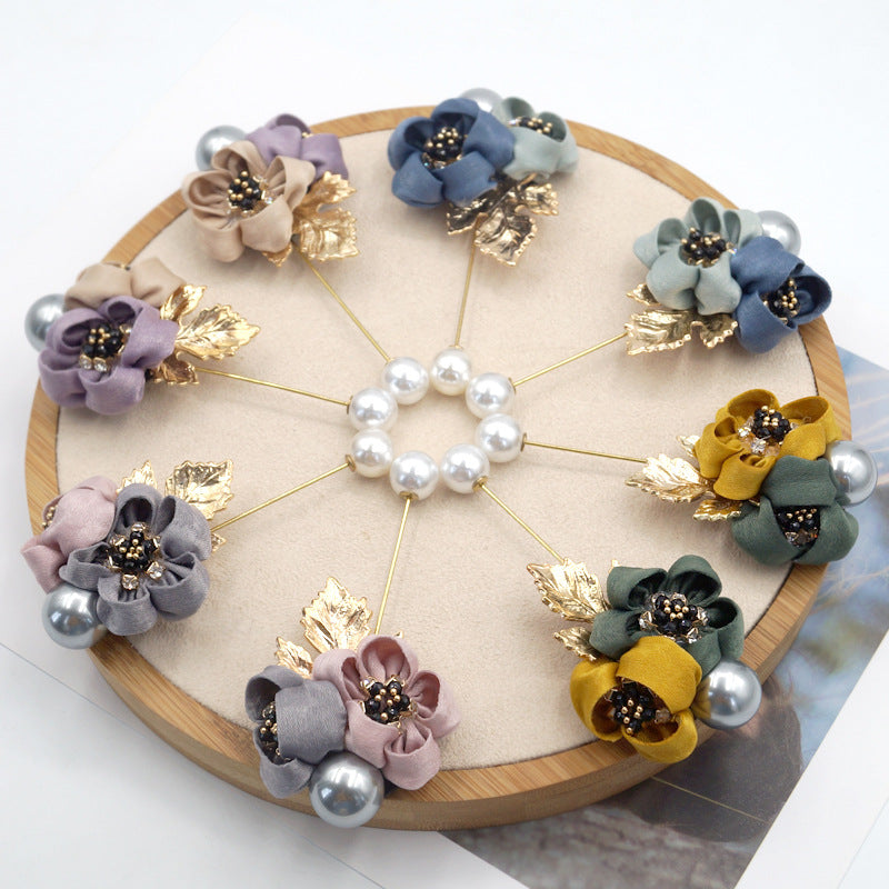 Broche fleur de perles