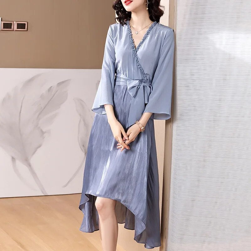 Spring and summer women's fashion V-neck nine point sleeve irregular silk silk dress