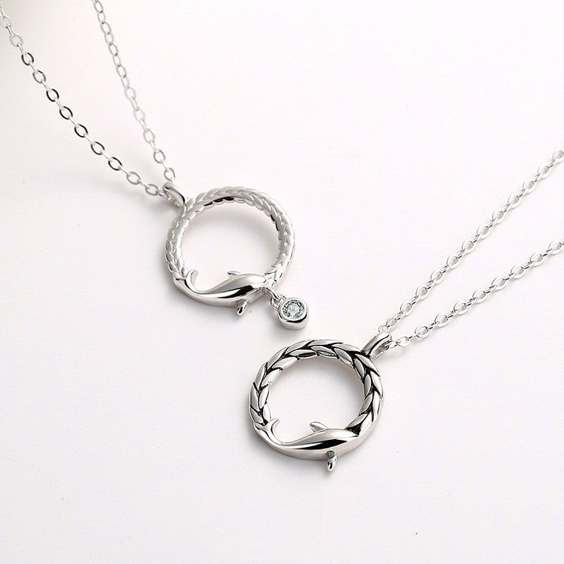 Fisk med dig en argent sterling par halsband.