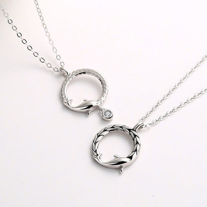 Fisk med dig en argent sterling par halsband.