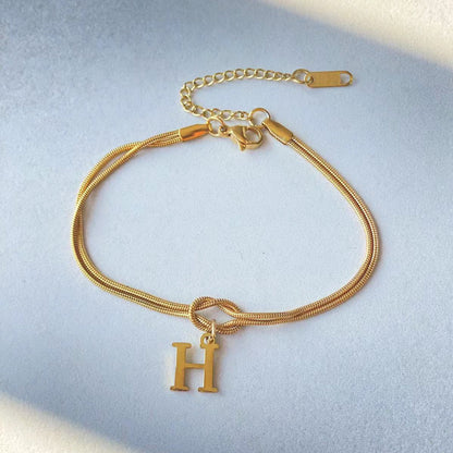 Nya bokstaven AZ kärleksknut armband för kvinnor par guldfärg läcker ormkedja berlockarmband rostfritt stål smycken present alla hjärtans dag presenter